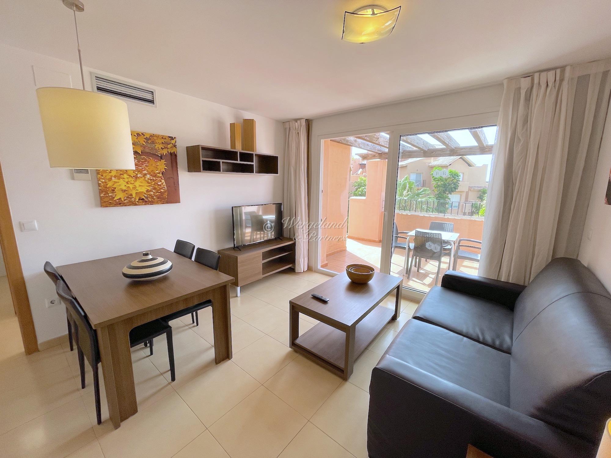 Furnished north-facing golf apartment, 1 bedroom/1 bathroom, garage space [10823]